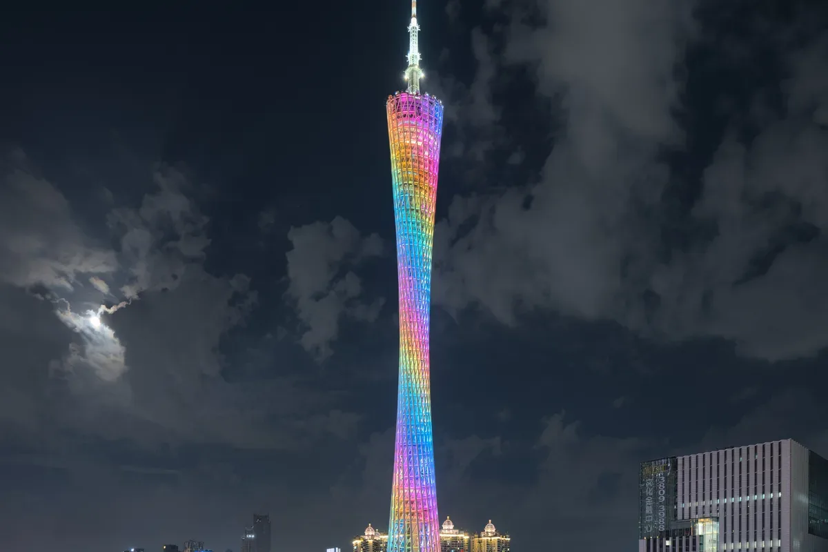 Canton Tower lit up at night over Guangzhou