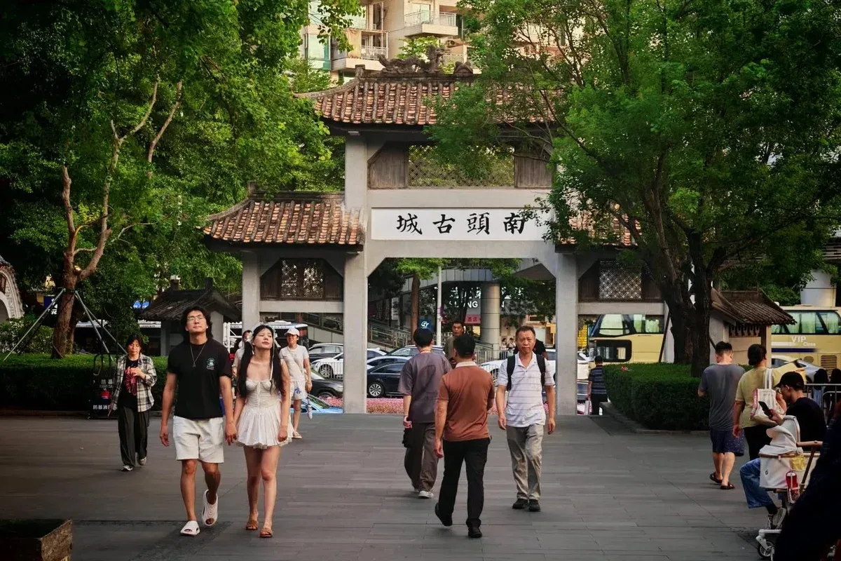 Visitors walking through the south gate of Nantou Ancient Town, Shenzhen